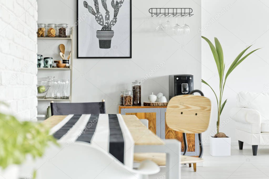 White interior with wooden table