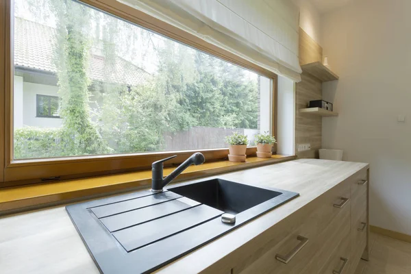 Bright kitchen with panoramic view of the neighbourhood — Stock Photo, Image