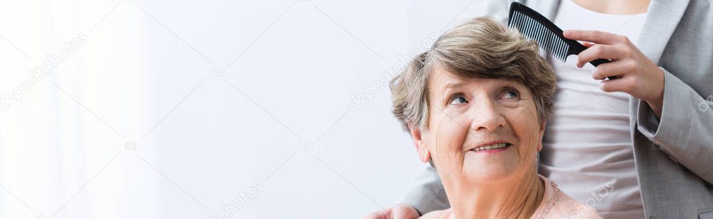 Brushing woman's hair