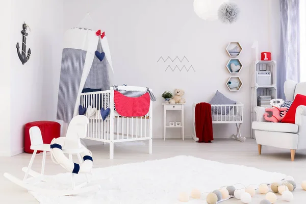 Bright room with crib — Stock Photo, Image