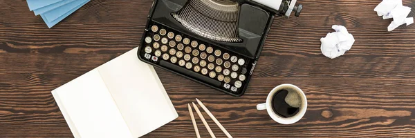 Desk with old typewriter and coffee — Stock Photo, Image