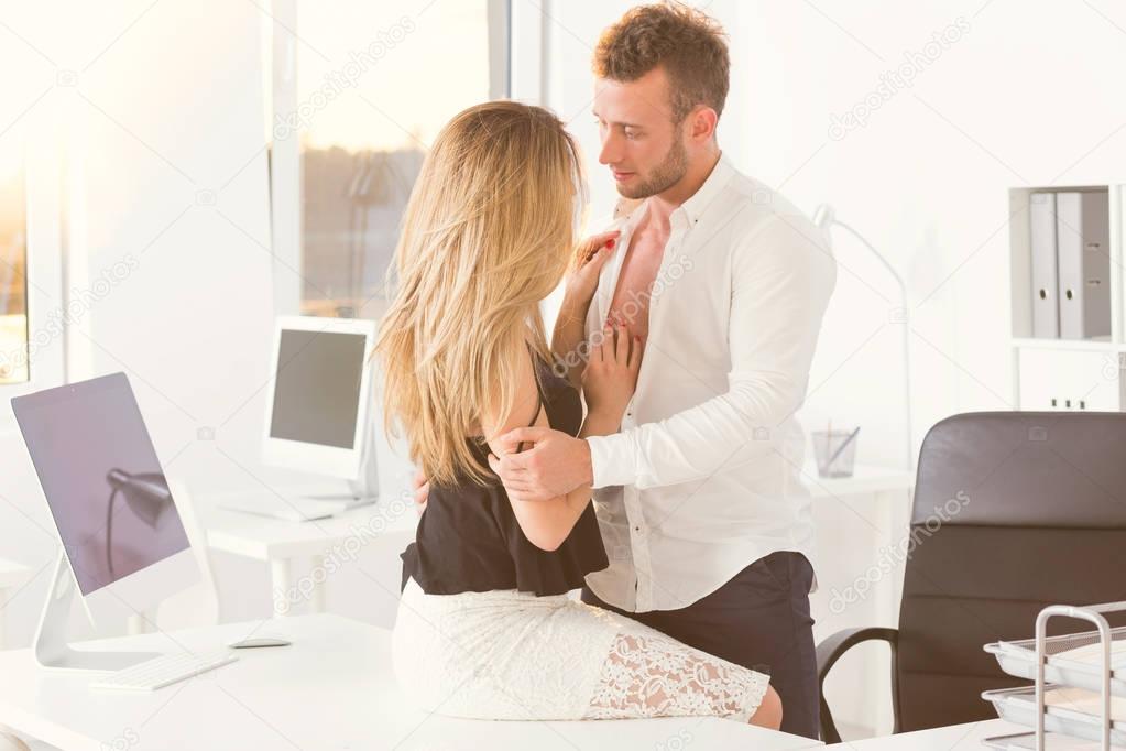 Employees getting intimate in the office