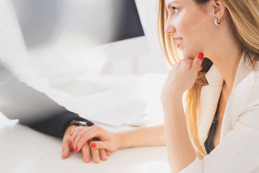 Businesswoman seductively holding colleague's hand