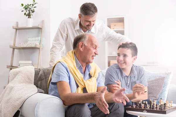 Grandfather and grandson playing chess — Stock Photo, Image