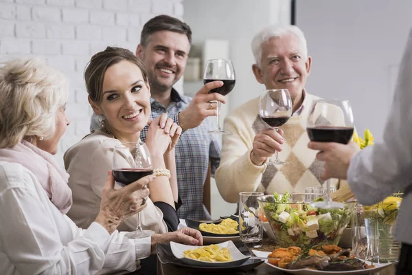 Joyful family celebrating dinner — Stock Photo, Image