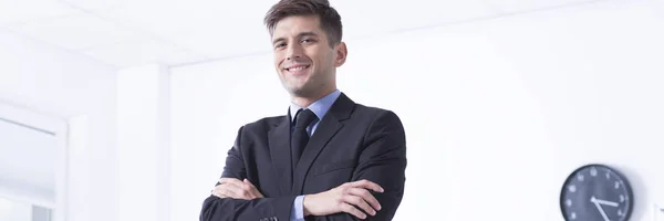 Smiling employee in suit