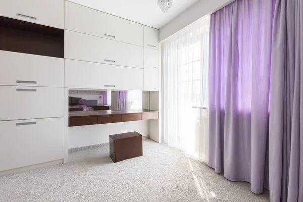 Purple curtains in the bedroom — Stock Photo, Image