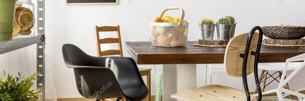 Chairs around wooden table