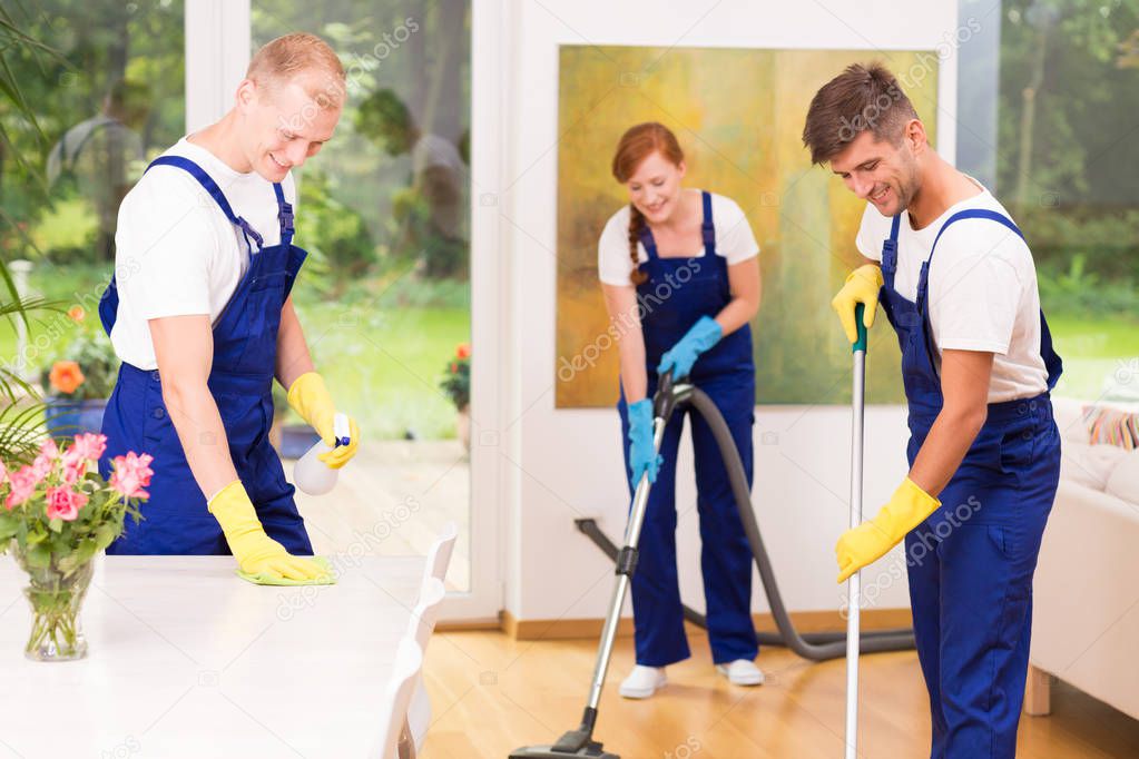 Housekeepers cleaning floor
