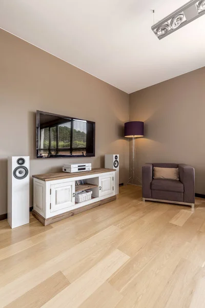 TV and cabinet in spacious room — Stock Photo, Image