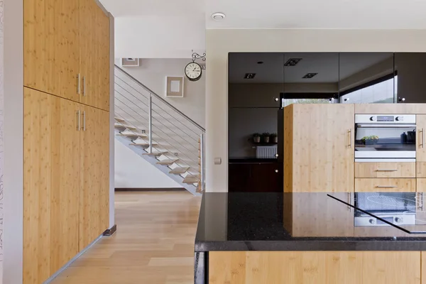 Spacious kitchen with wooden furnitures