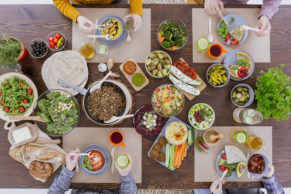 Friends eating vegetarian food