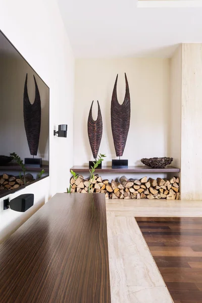 Modern fireplace wood storage inside house — Stock Photo, Image