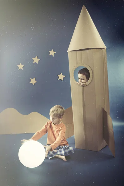 Night with boy in rocket — Stock Photo, Image