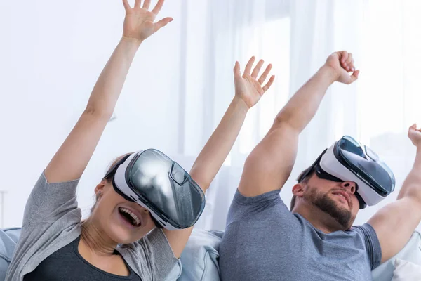 Excited couple with VR goggles — Stock Photo, Image