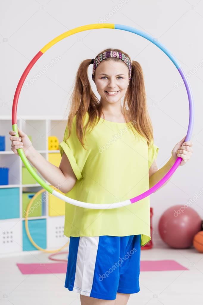 Sportswoman with hula hoop