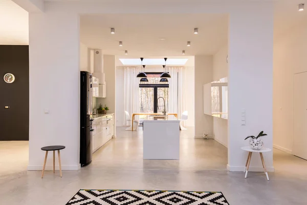 Big white kitchen with island