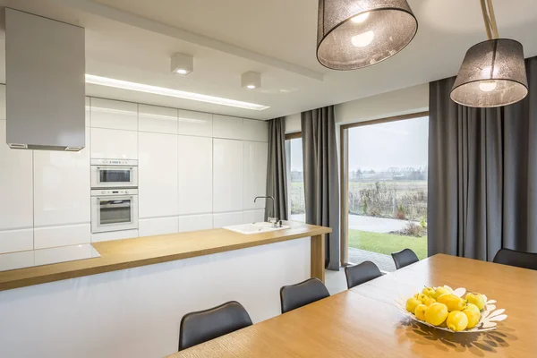 Kitchen with dining table — Stock Photo, Image