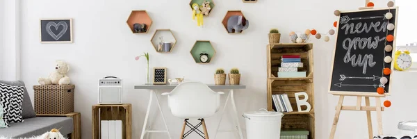 Kids room with geometric shelfs — Stock Photo, Image