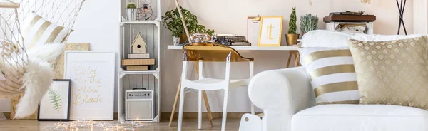 White room with armchair