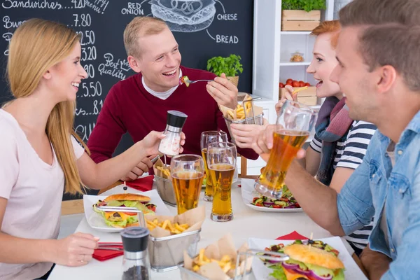 Meeting of friends at the table — Stock Photo, Image