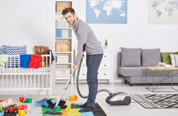 Happy first time dad vacuuming — Stock Photo, Image