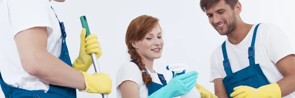 Woman holding a cleaning agent — Stock Photo, Image