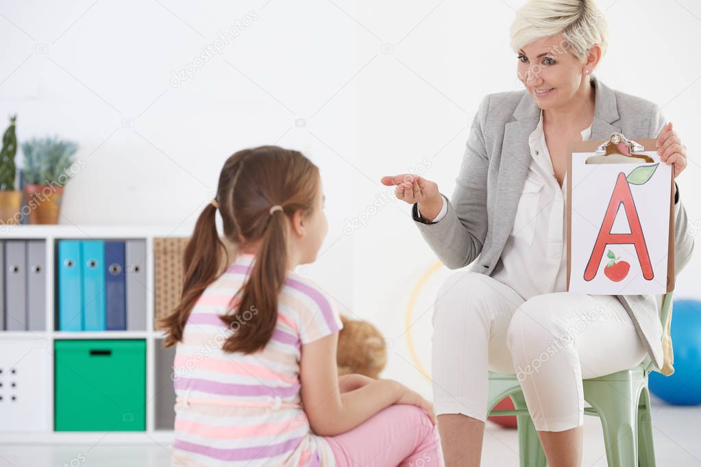 Speech therapist and child