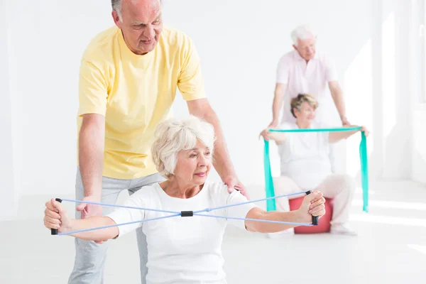 Senior people exercising
