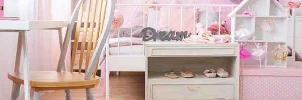 Shelf with ballet shoes in bedroom