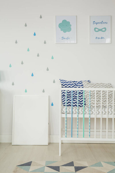 White room with baby cot
