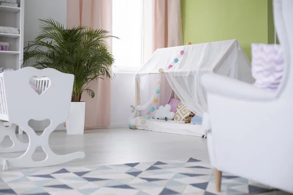 Crib and playhouse with canopy — Stock Photo, Image