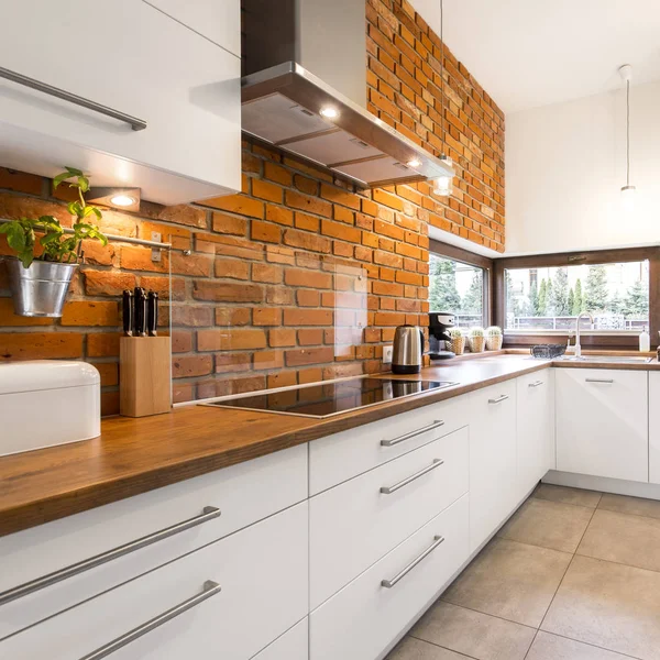 Brick wall in modern kitchen — Stock Photo, Image