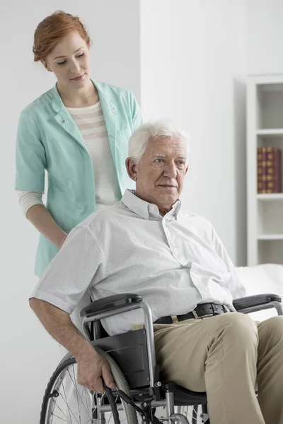 Man on a wheelchair — Stock Photo, Image