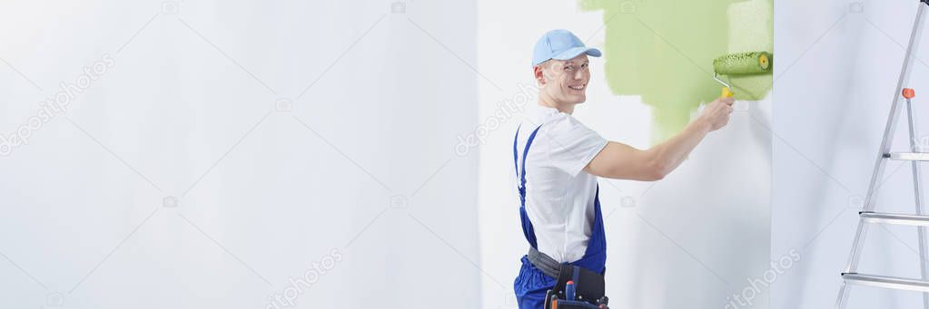House painter applying paint