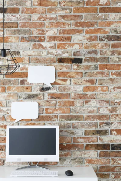 Home office with brick wall — Stock Photo, Image