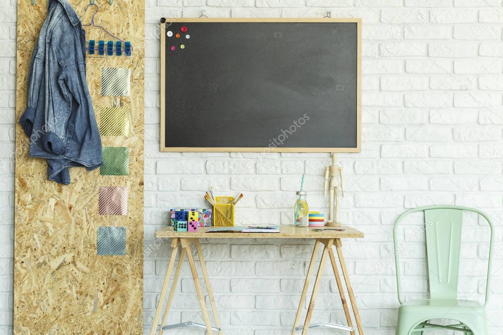 Desk, blackboard, chair and osb board