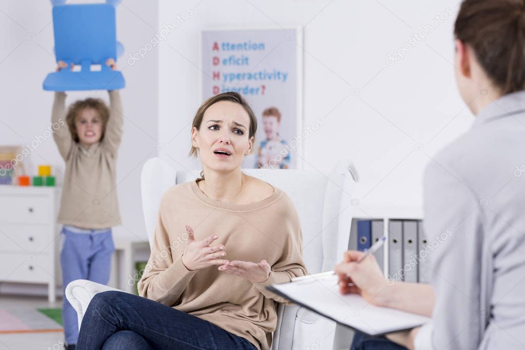 Mother confiding in therapist