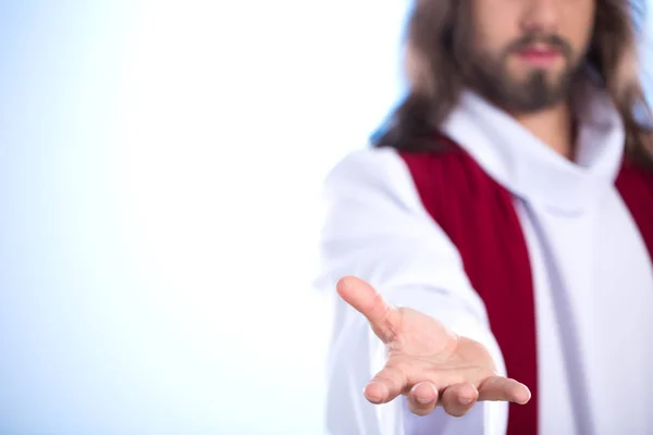 イエスは彼の手を差し伸べる — ストック写真