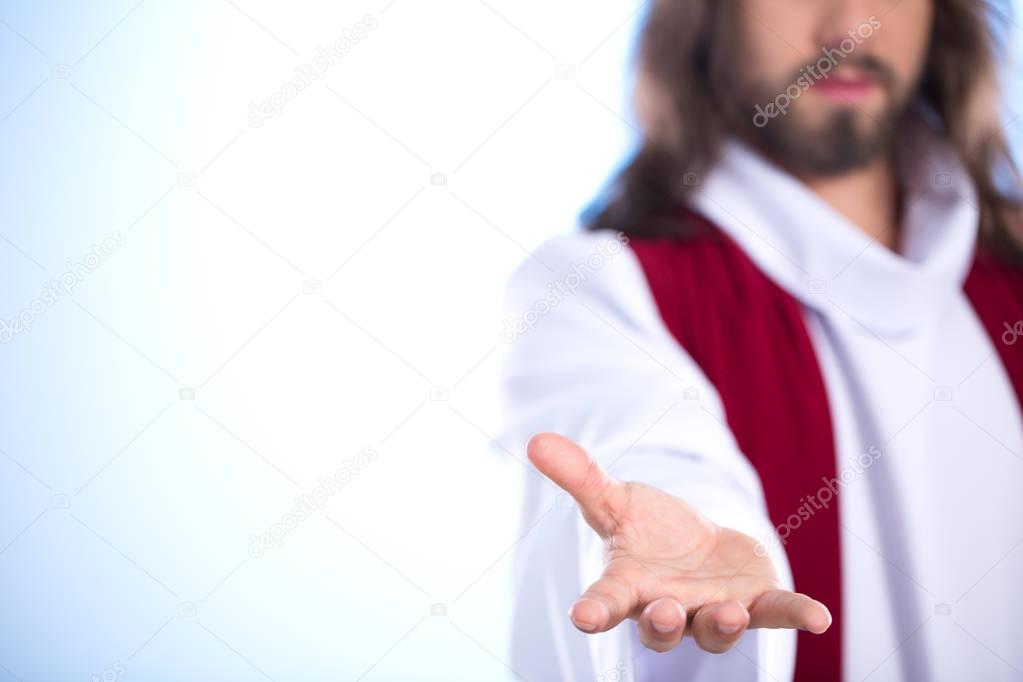 Jesus reaching out his hand