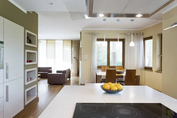 White kitchen island with electric cooktop — Stock Photo, Image