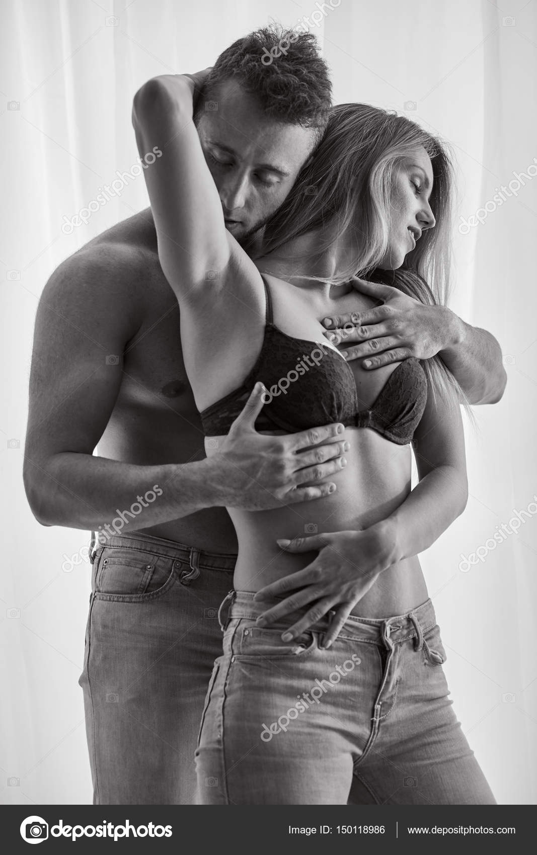 Man touching his womans breasts Stock Photo by ©photographee.eu 150118986