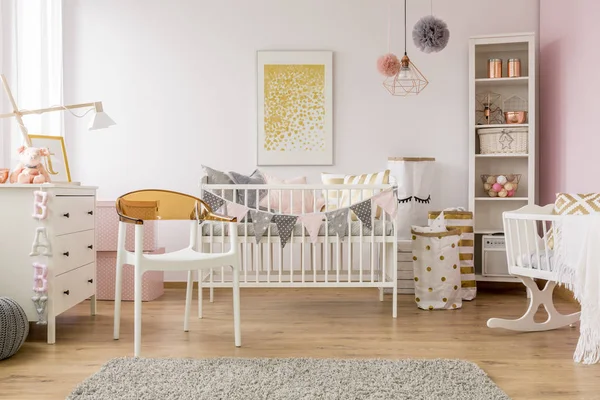 Baby bedroom with white chair — Stock Photo, Image