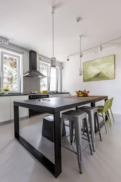 Black countertop table in minimalist kitchen — Stock Photo, Image