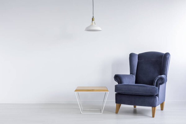 Coffee table and armchair