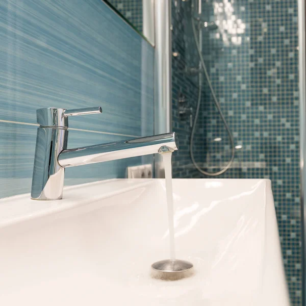 Modern sink in blue bathroom — Stock Photo, Image