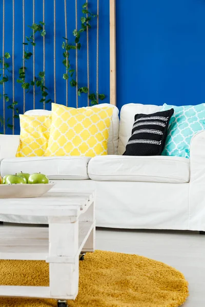 Yellow, blue and white room