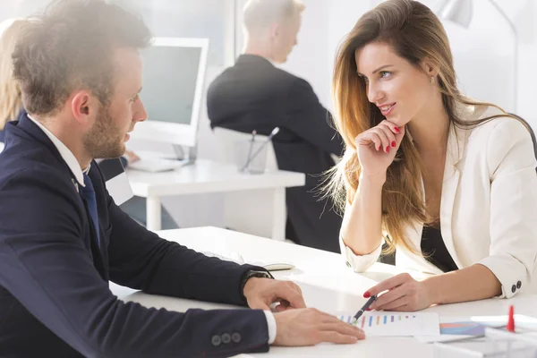 Woman looking teasingly at her colleague — Stock Photo, Image