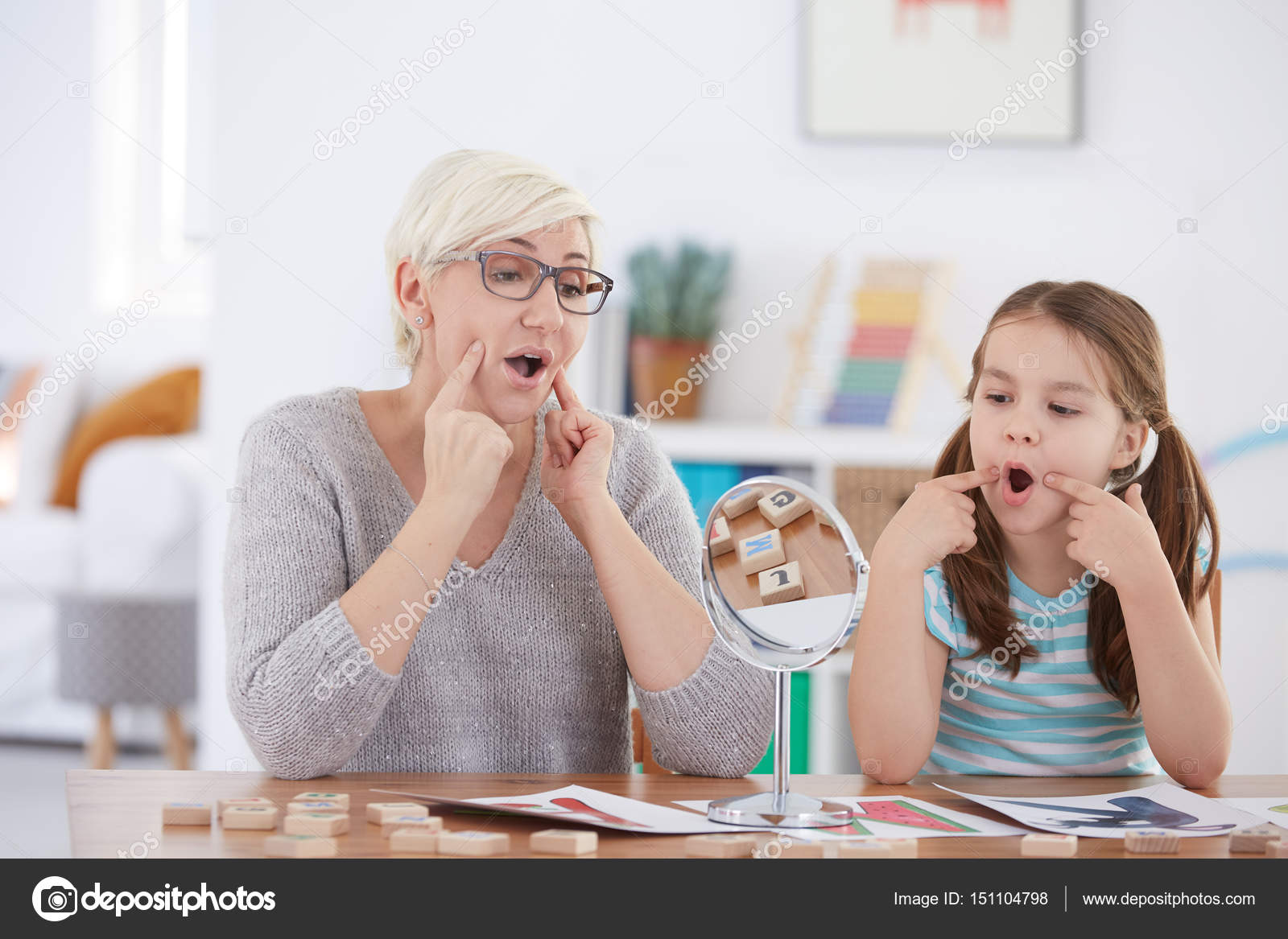 Proper articulation therapy for girl — Stock Photo © photographee.eu