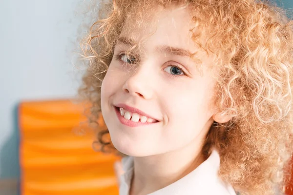 Happy boy with curly hair — Stock Photo, Image